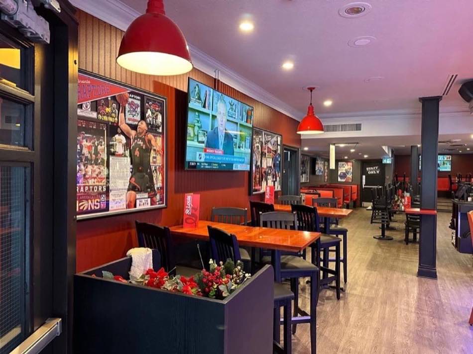 Dining room with booth seating and screens