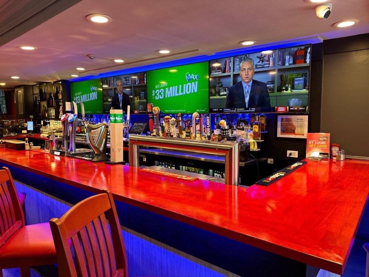 Custom bar and servery build with beer taps and screens, St. Louis Bar & Grill Toronto