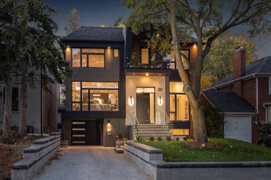 Custom modern home exterior at dusk in Etobicoke, Toronto