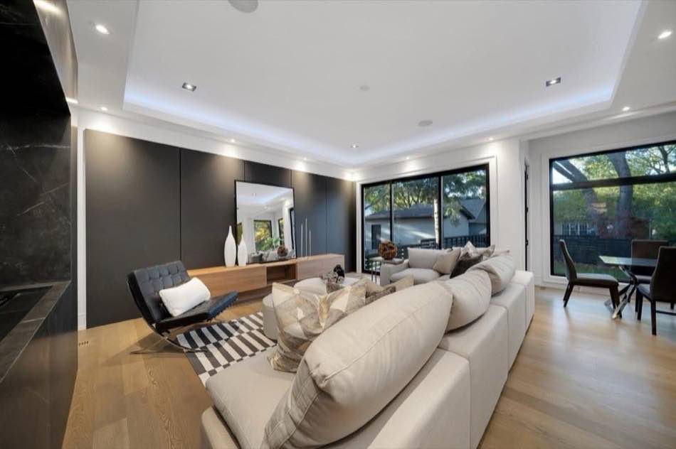 Family room with floor-to-ceiling windows