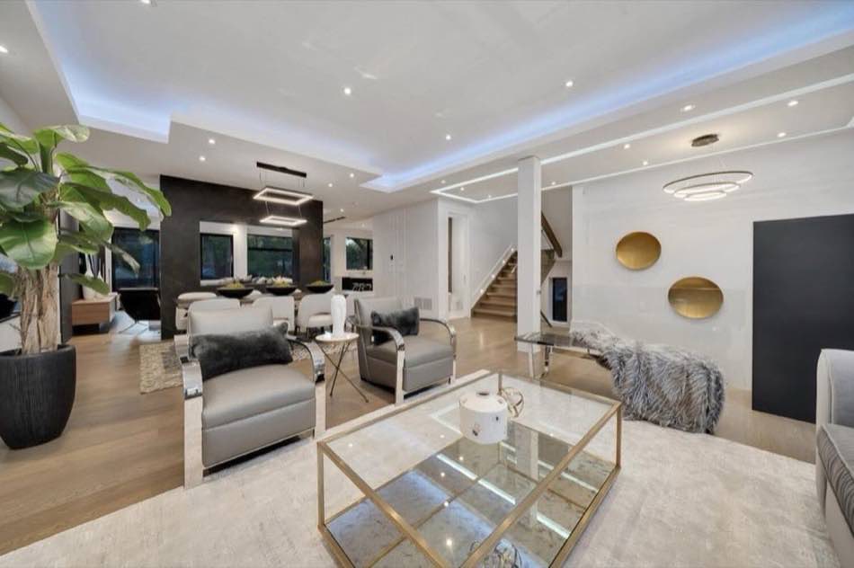 Open-concept luxury living room with designer furnishings
